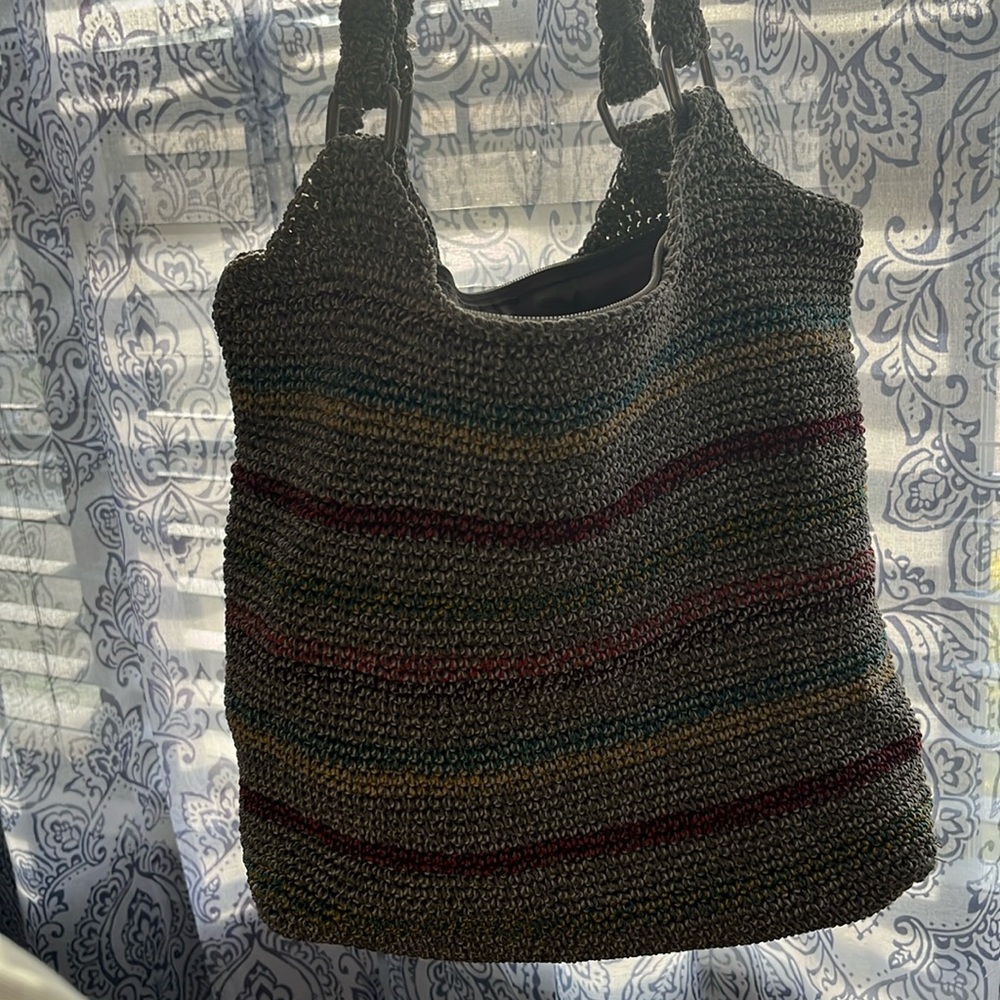 the sak bag. very good condition. not used much. gray with rainbow colors.